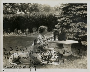 Helen Keller with Three Dogs