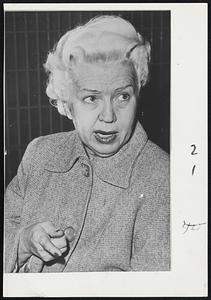 Mother of Beverly Adlund, 17-year-old protege of the late Erroll Flynn, landed in jail at Los Angeles. Mrs. FlorenceAadlund pounded on door of Jack Dulin, a suitor of her daughter, and demanded to see Beverly. Dulin said the girl wasn't there and fired a shot out of the window to scare away Mrs. Aadlund. He was not held.