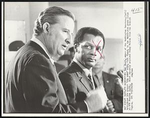 Bob Short, owner of the Washington Senators, (left) introduces his newest "big name" star, Curt Flood, to the Washington press corps at RFK Stadium 11/24. Short recently acquired Denny McLain from the Detroit Tigers.