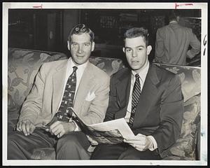 Left and Right arms of Detroit pitching staff pose at Hotel Kenmore before today's doubleheader with the Red Sox. They are Hal Newhouser (left, lefty) and Arthur Houtteman (right-hander).
