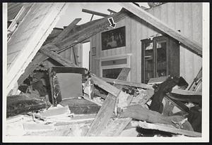 Ravaged By Tornado - Pictures of the houses destroyed in the Winthrop Oaks section of Holden show the hit and miss pattern the tornado followed in destroying these houses. Arrow in middle photo points to a picture of the "Last Supper" that survived in a Main St. house in Holden.