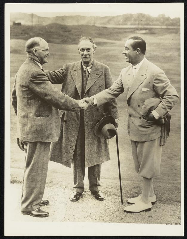 Shaking Hands Before The Battle. Water Eagen, (right), captain of the American Ryder Cup team, shaking hands with J. H. Taylor, (left), the non-playing captain of the British Team, wishing each other luck, as Samuel Ryder, donor of the cup, looks on. The photograph was taken at Southport, England, where the matches were played, with the British emerging victors, 6 1/2 to 5 1/2.