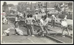 At upper right Boy Scouts from Troop 727 (St. Joseph's Parish) spruce up along the tracks on North avenue.