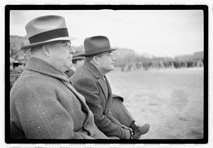 Boston Parks Department Commissioner William Long watching a football game, Back Bay Fens