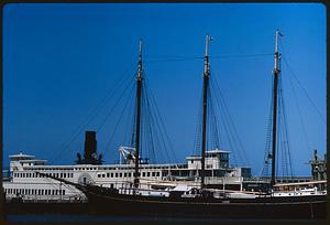 Side view of Eureka ferryboat and other boat docked at pier, San Francisco Maritime Museum
