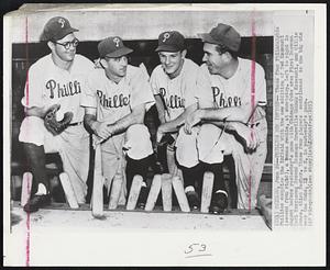 Phillies New Infield -- These four Philadelphia Phillies comprise the infield with the new addition of Ted Kazanski (second from right), a bonus rookie, at shortstop. Left to right in dugout before yesterday's game with Chicago Cubs are: First Baseman Earl Torgeson; Second Baseman Granville Hamner; Kazanski, and Willie Jones, third Sacker. These four players contributed to the big win over the cubs, 13 to 2, in yesterday's game.