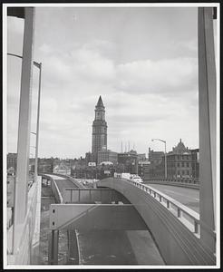 The Old and the New - The venerable Custom House tower looks down on new and still uncompleted section of Boston's Central Artery in this photo of striking contrasts taken by Willard P. Grush of R. M. Bradley & Co.