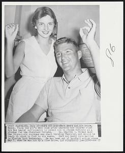 Wife And Eye -- Herb Score and his bride, Nancy, flash the all's well sign after learning his injured right eye has healed sufficiently to permit him to resume workouts as a pitcher for the Cleveland Indians. Dr. Charles I. Thomas said the 24-year-old southpaw can start throwing Thursday, and should be ready to pitch in four to six weeks. Herb and Nancy were married in Florida last Wednesday. He has been out of baseball action since May 7, when he was hit by a line drive.