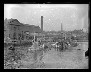 Large wooden salvage or stowage pontoons in water, Charlestown Navy Yard
