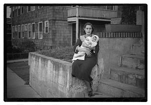 Mercedes Pasarell Sanromá holding a baby