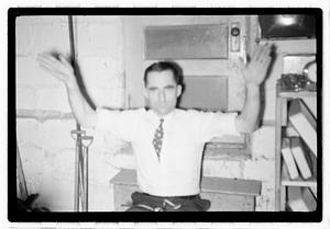 A man holding up his hands