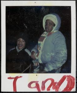 Two children all bundled up
