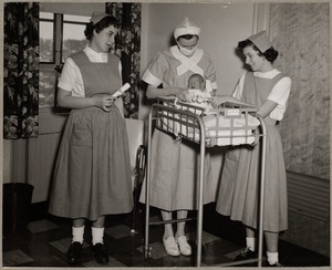 Symmes Hospital nurse with infant and two aides