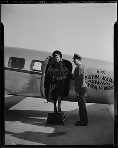 Sonja Henie arriving by airplane