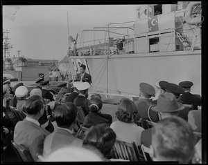 Mohammed Ali, Ambassador of Pakistan, addresses the crowd in front of a military ship
