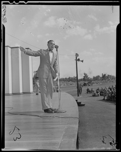 Eddie Cantor at the microphone, addressing the crowd
