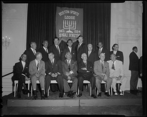 Group photo of the athletes honored at the seventh B'nai B'rith dinner at the Sheraton Plaza. Front (l. to r.): Eddie Arcaro (horse racing); Don Budge (tennis), Jack Dempsey (boxing), Ed "Strangler" Lewis (wrestling), Francis Ouimet (golf), Eddie Shore (hockey), Ty Cobb (baseball). Rear (l. to r.): Joe Linsey, president of the B'nai Brith Sports Lodge, Benny Friedman (football), Johnny Weissmuller (swimming), Bob Cousy (basketball), Chuck Connors (TV star), Willie Mosconi (billiards), Jessie Owens (track) and Sam Cohen, Past president of the Sports Lodge.