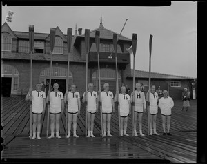 Group photo of 1914 Harvard Crew team on the dock during a reunion