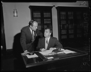 Two men at a desk