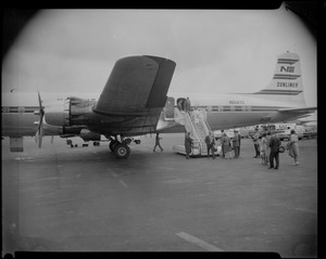 Mrs. Lyndon B. Johnson, wife of President, deplanes at Logan Airport following her flight from Washington D.C.