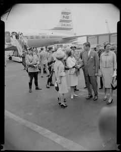 Mrs. Lyndon B. Johnson, wife of President, deplanes at Logan Airport following her flight from Washington D.C. and is welcomed by fans