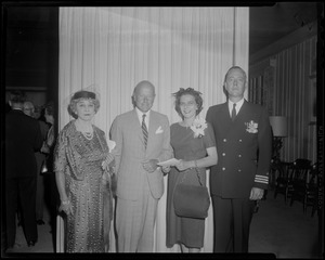 Comdr. Munroe and his wife, Carolota Supulveda Chapman, with two guests of the Charles F. Adams missile ship commissioning