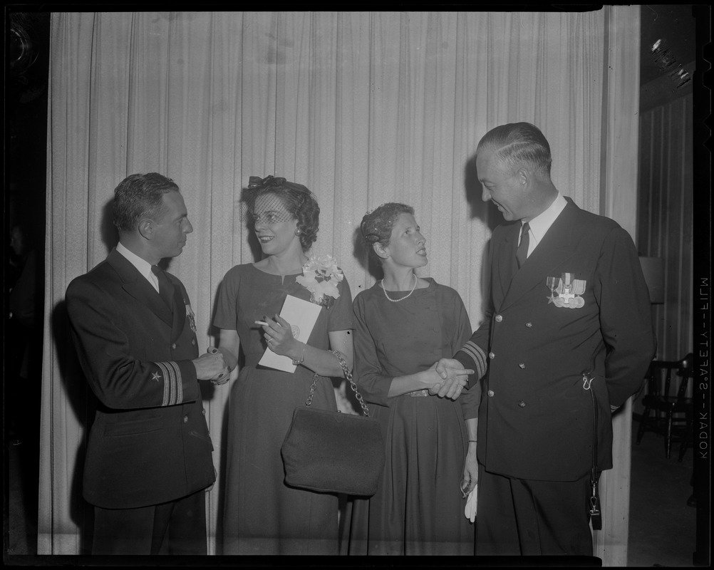 Comdr. Munroe and his wife, Carolota Supulveda Chapman, with two guests of the Charles F. Adams missile ship commissioning