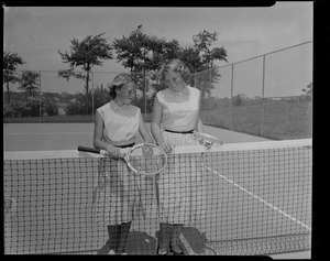 Princess Irene (left) and Crown Princess Beatrix (right) play tennis during a vacation in Chatham