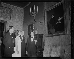 Princess Juliana, with Prince Bernhard, look at Rembrandt's painting titled "A Lady and a Gentleman in Black" in the Dutch Room of the Isabella Stewart Gardner Museum