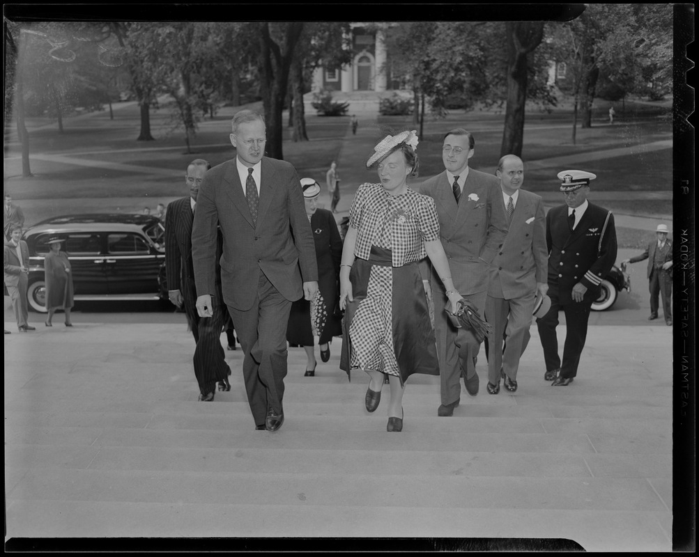 Princess Juliana and Prince Bernhard walking up stairs