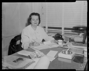 Louise Hicks at desk