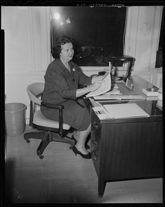 Louise Hicks at desk