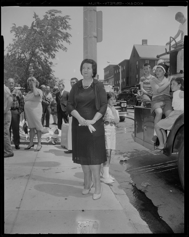 Mrs. Louise Day Hicks, School Committee Chairman, watches as flames engulf Norcross Elementary School, South Boston