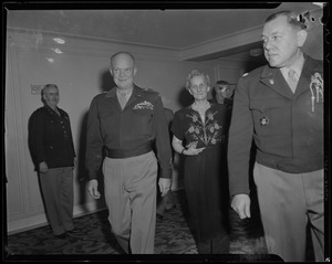 General Eisenhower walking with his wife Mamie