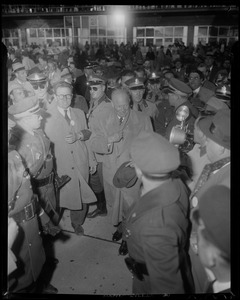 General Eisenhower moving through the crowd