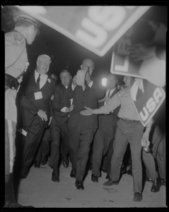 President Johnson walking through the crowd