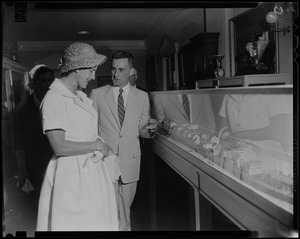 Lilian, Princess of Réthy and another man look at a diorama, possibly in a museum