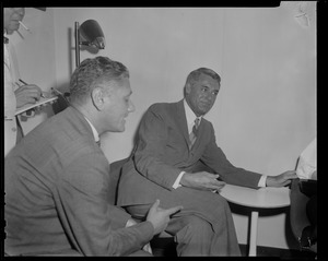 Cary Grant listening in a discussion