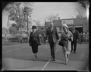 Mayor John F. Collins with his mother Mrs. Margaret Collins and wife Mary, walking