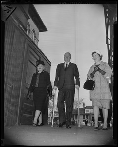 Mayor John F. Collins with his mother Mrs. Margaret Collins and wife Mary, walking