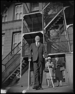 Mayor John F. Collins with his mother Mrs. Margaret Collins and wife Mary behind him