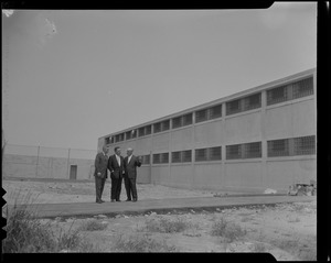 J. David White, George F. McGrath, and Warden John Gavin standing outside of the Walpole Prison