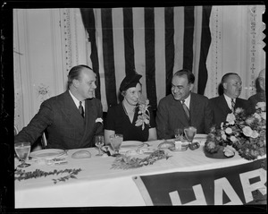 Richard A. Edwards, Jr., Mrs. Edward R. Mitton, Edward Mitton, and Burnelle Hawkins at the head table at the testimonial dinner for Edward R. Mitton at the Copley Plaza