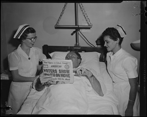Nurses Alice Kirwin and Rhoda Lipnick congratulate John F. Collins on his City Council win, with the Record American newspaper