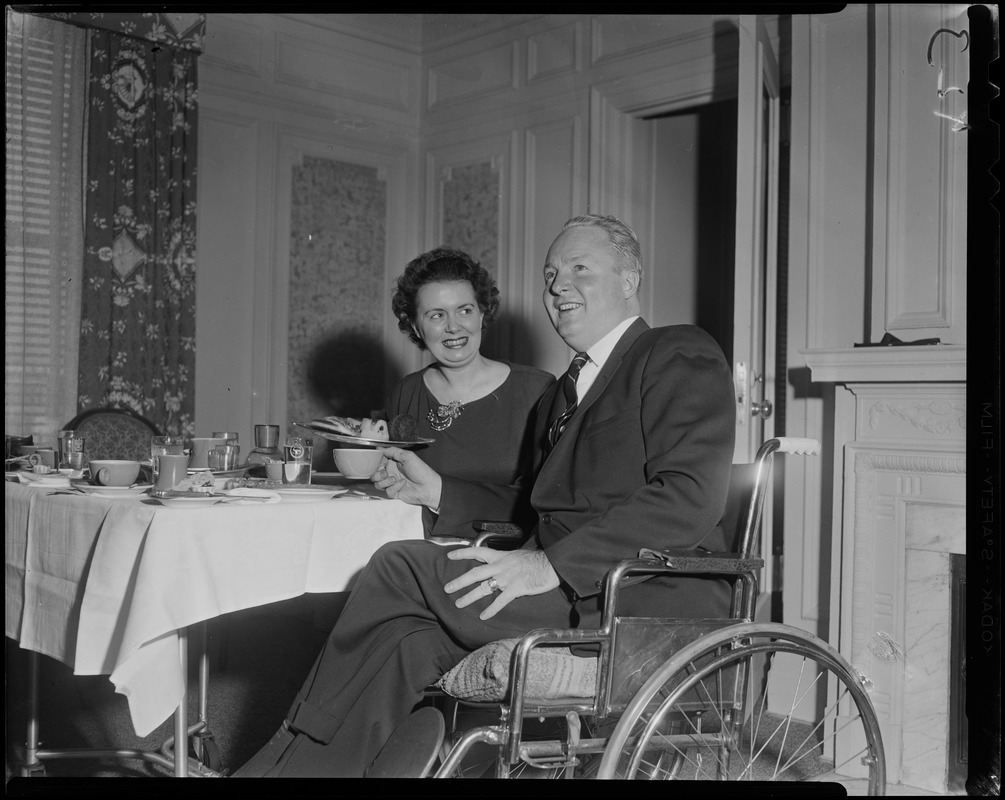 Mary and John F. Collins at the table