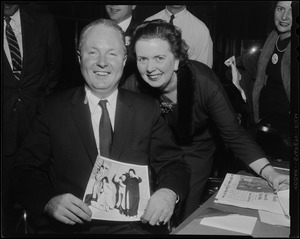 Mayor-elect John F. Collins with his wife Mary and holding a photograph of his family