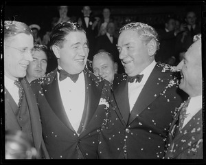 James M. Curley with others at a rally, after a confetti drop