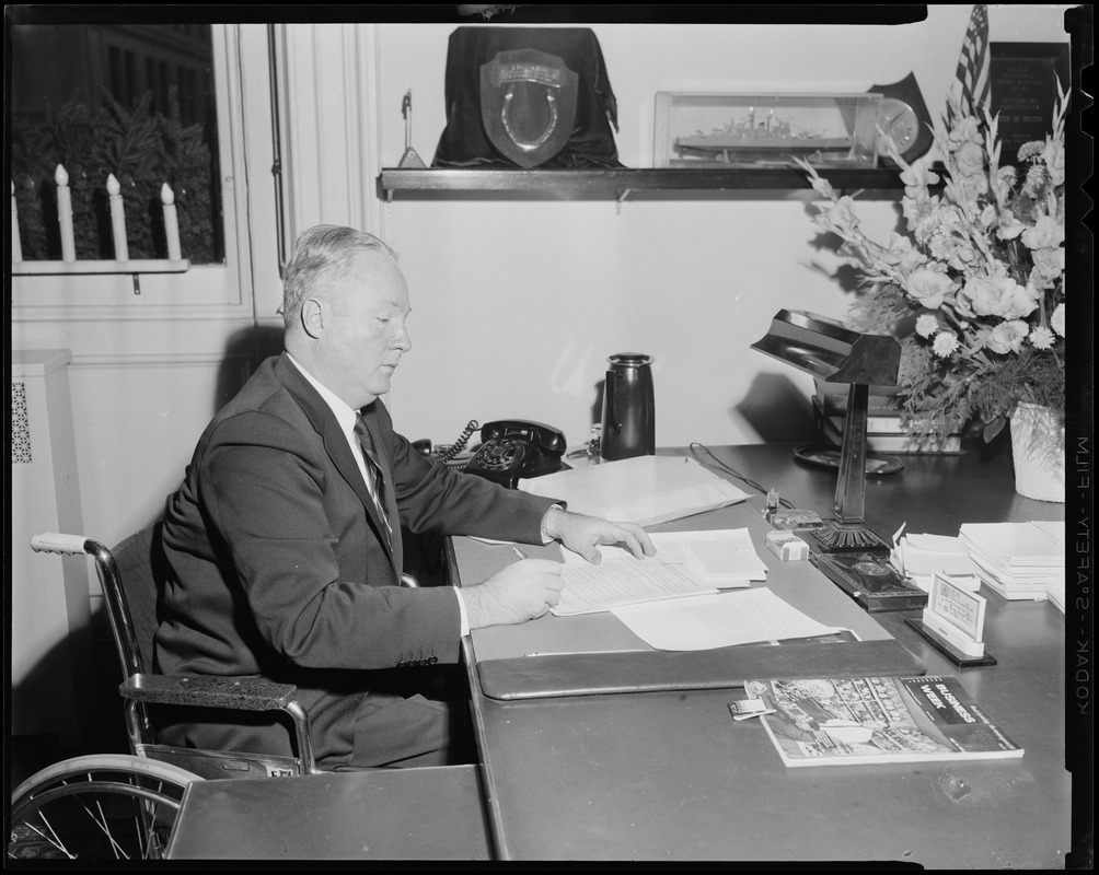 Mayor Collins at desk