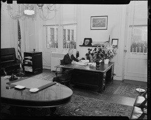 Mayor Collins in office, at his desk