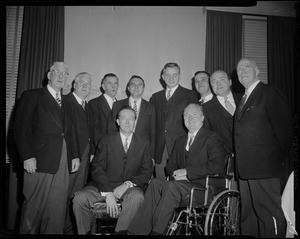 Mayor Collins poses with a group of men at inauguration